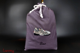 Laundry bag with sneakers embroidery